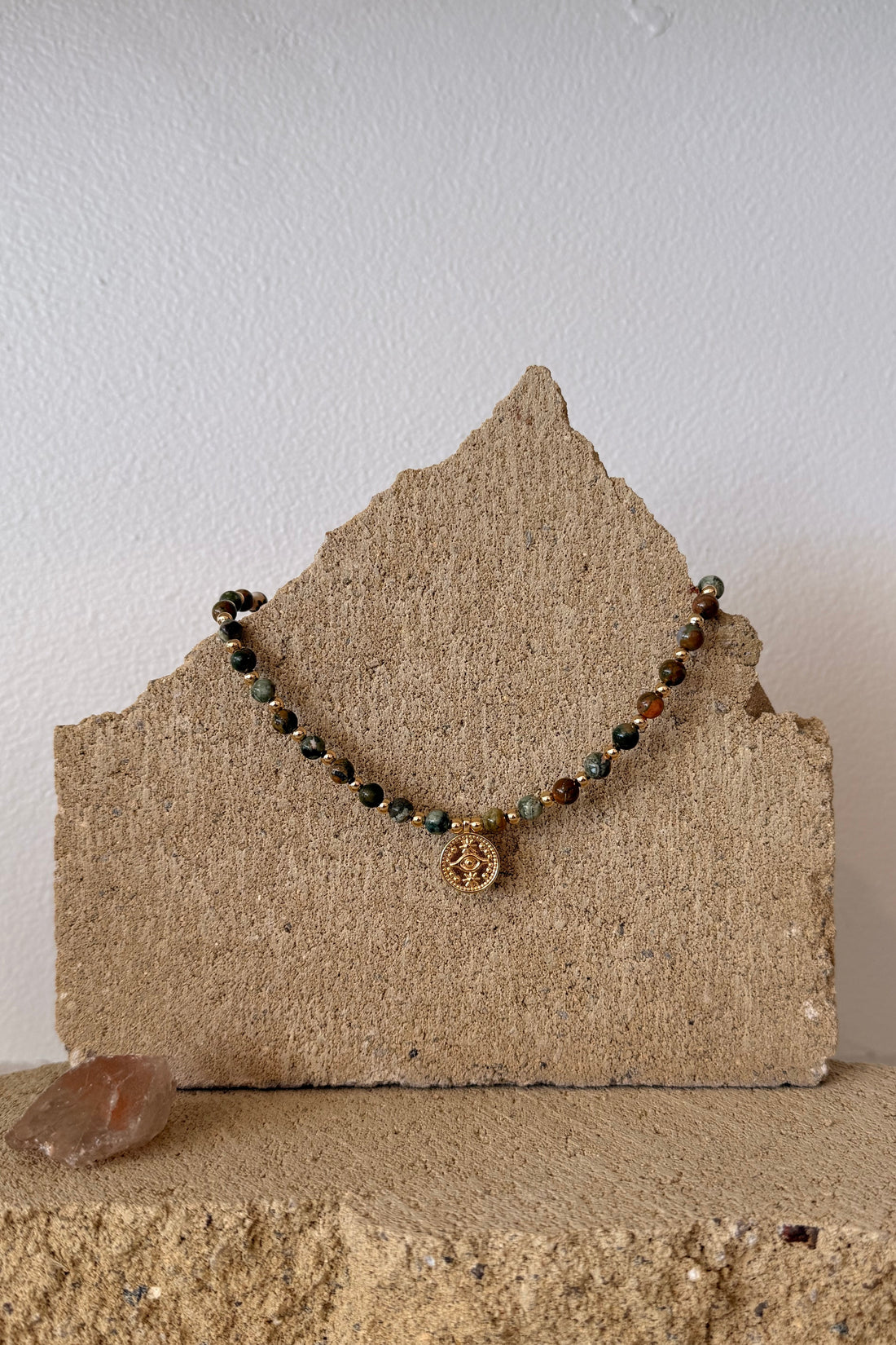 Bracelet with beads on a textured surface
