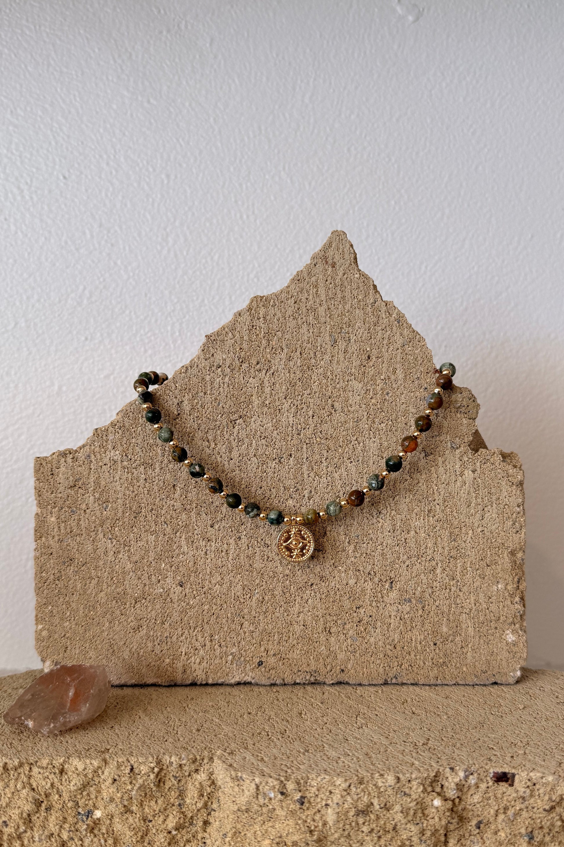 Bracelet with beads on a textured surface