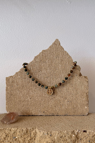 Bracelet with beads on a textured surface