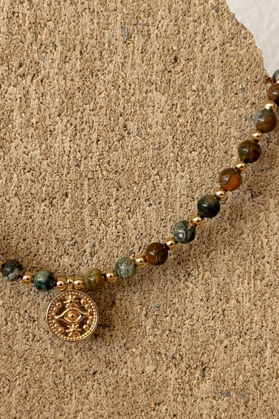 Bracelet with beads on a textured surface